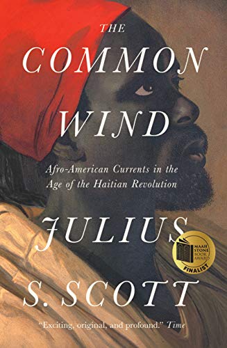 Book cover: portrait of a Black man in a red headwrap, “The Common Wind.”