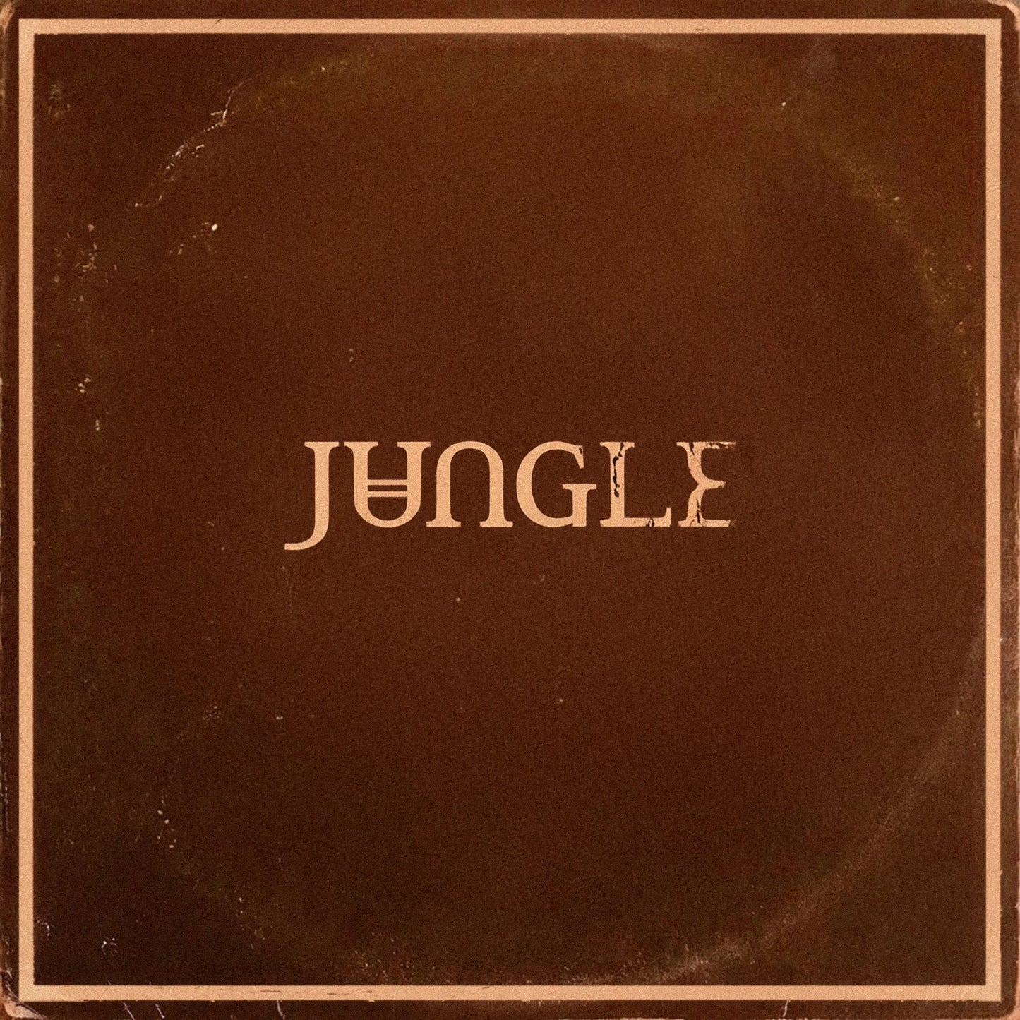 Dark brown CD cover with the word "JUNGLE" in stylized beige text.