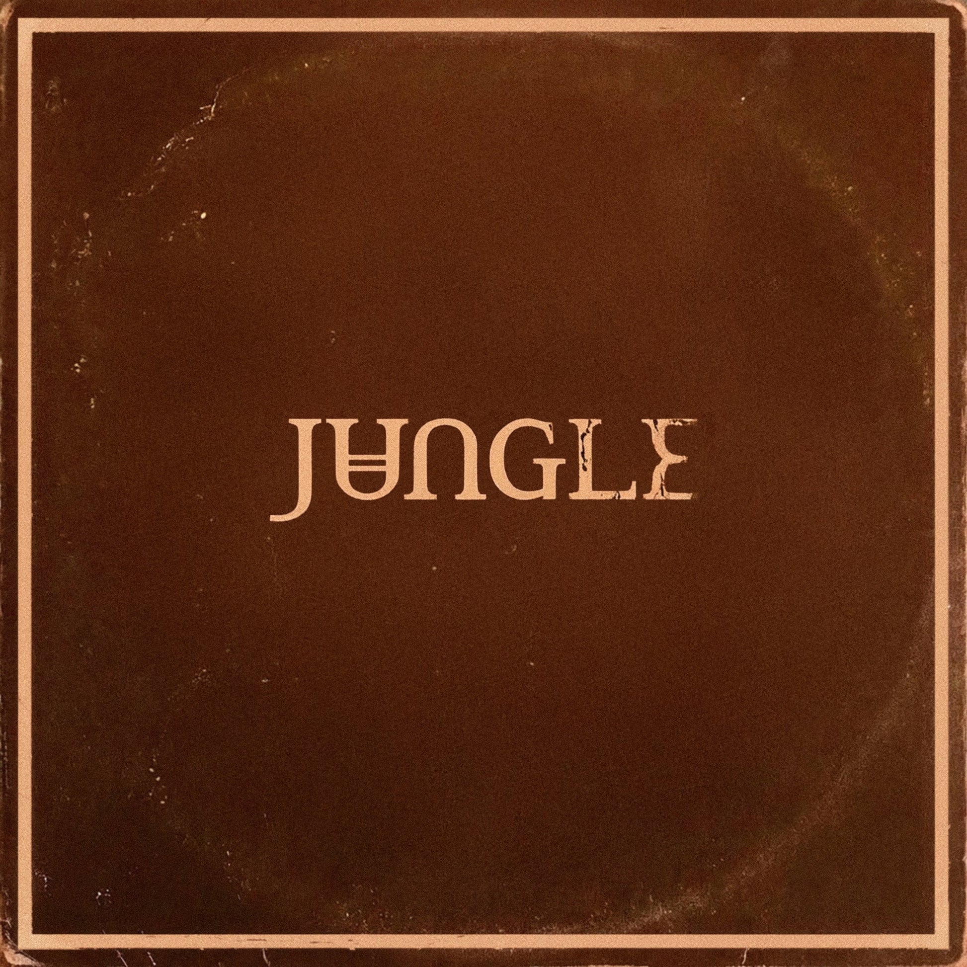 Dark brown CD cover with the word "JUNGLE" in stylized beige text.