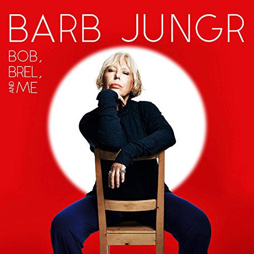"Album cover with a woman sitting on a chair against a red background."