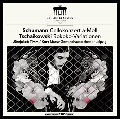 Black and white vinyl cover with cellist behind a wire fence, flowers, and text.