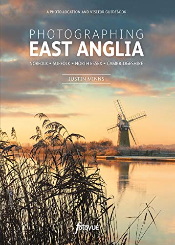 Book cover featuring a windmill at sunset over reeds and water.