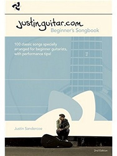 Blue "Justinguitar.com Beginner's Songbook" cover with guitar image and seated man.