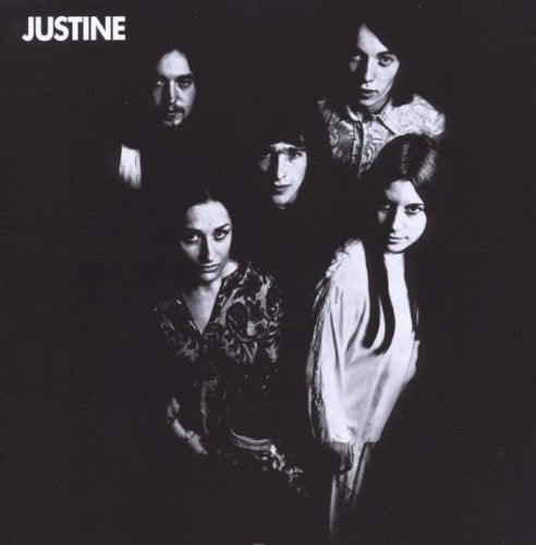 Black and white album cover featuring a group of five people.