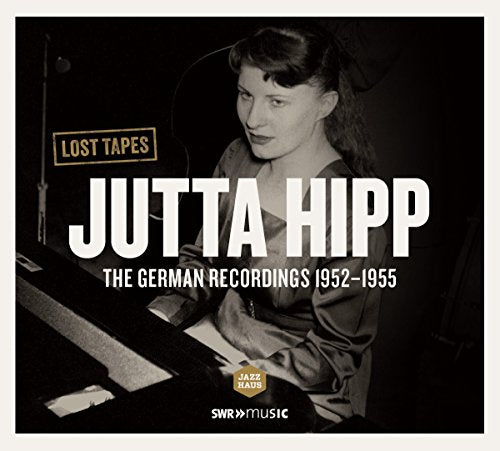 Jutta Hipp album cover with a black-and-white photo of a woman playing piano.