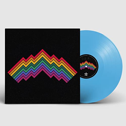 Wanderkid" vinyl record with colorful mountain design and light blue disc.