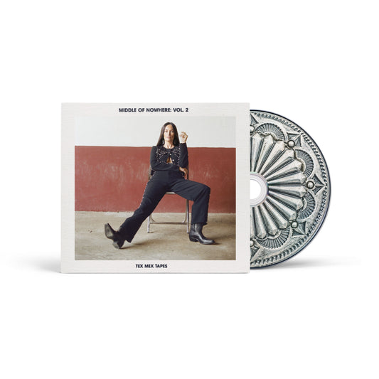 Kacey Musgraves album cover and CD, featuring a seated woman in boots.
