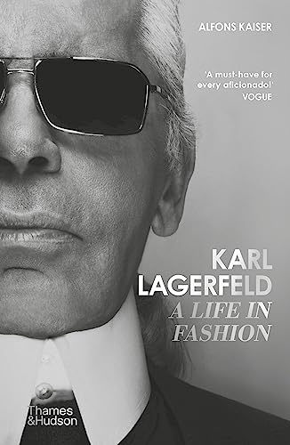 Black and white portrait of Karl Lagerfeld, book cover titled “A Life in Fashion.”