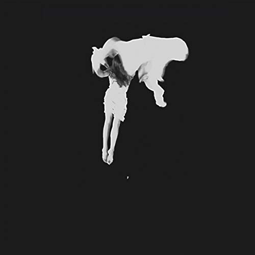 Black and white album cover with a ghostly figure of a woman.