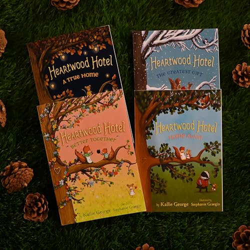 Four Heartwood Hotel children’s books stacked on moss with pinecones.