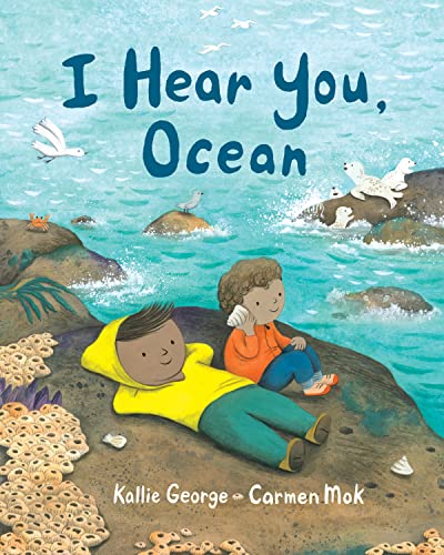 Book cover: child listening to the ocean with seagulls and seals.