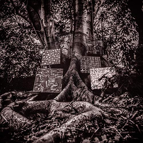 Vinyl album cover featuring a tree with abstract art panels.