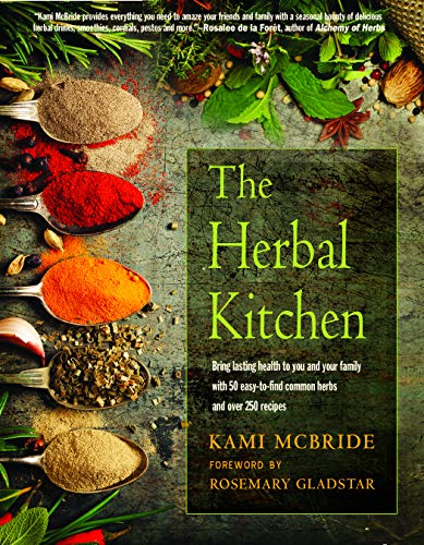 Book cover: "The Herbal Kitchen" with colorful spices and fresh herbs.