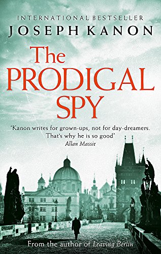 Book cover for “The Prodigal Spy” featuring a cityscape and lone figure.