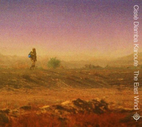 CD cover: lone figure walking across a hazy, golden landscape.