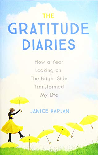 Book cover with blue sky, yellow umbrellas, and a woman walking.