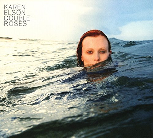 Karen Elson album cover: redheaded woman emerging from ocean waves.