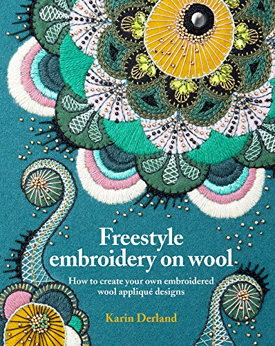Book cover with colorful floral embroidery on teal wool fabric.