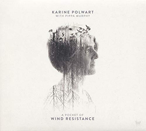 Album cover featuring a double exposure of a person's profile and forest trees.