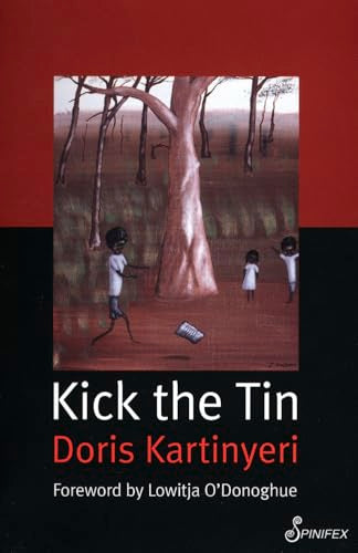 Book cover: children kicking a tin can in a sparse, red landscape.
