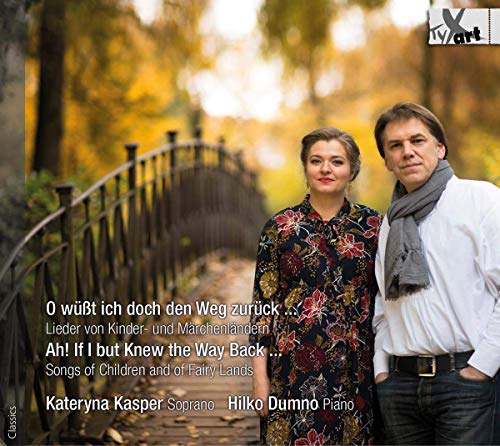 "CD cover with a man and woman standing together outdoors."