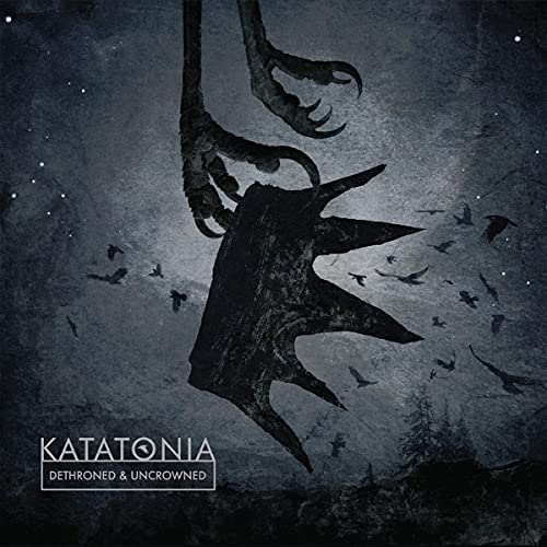 Katatonia album cover: dark, abstract imagery of claws and a crown.
