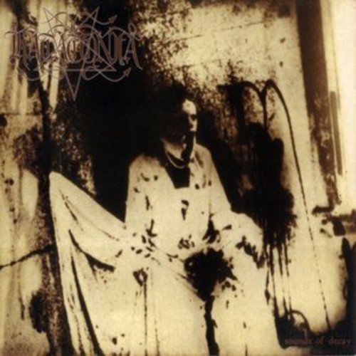 Katatonia album cover, faded image of a person in a room.