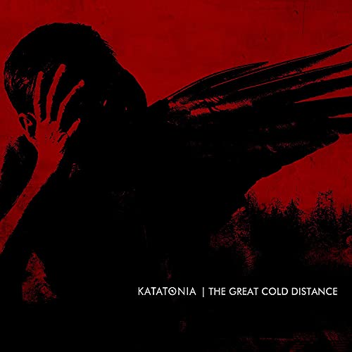 Red album cover with silhouetted figure and wings, text at bottom.