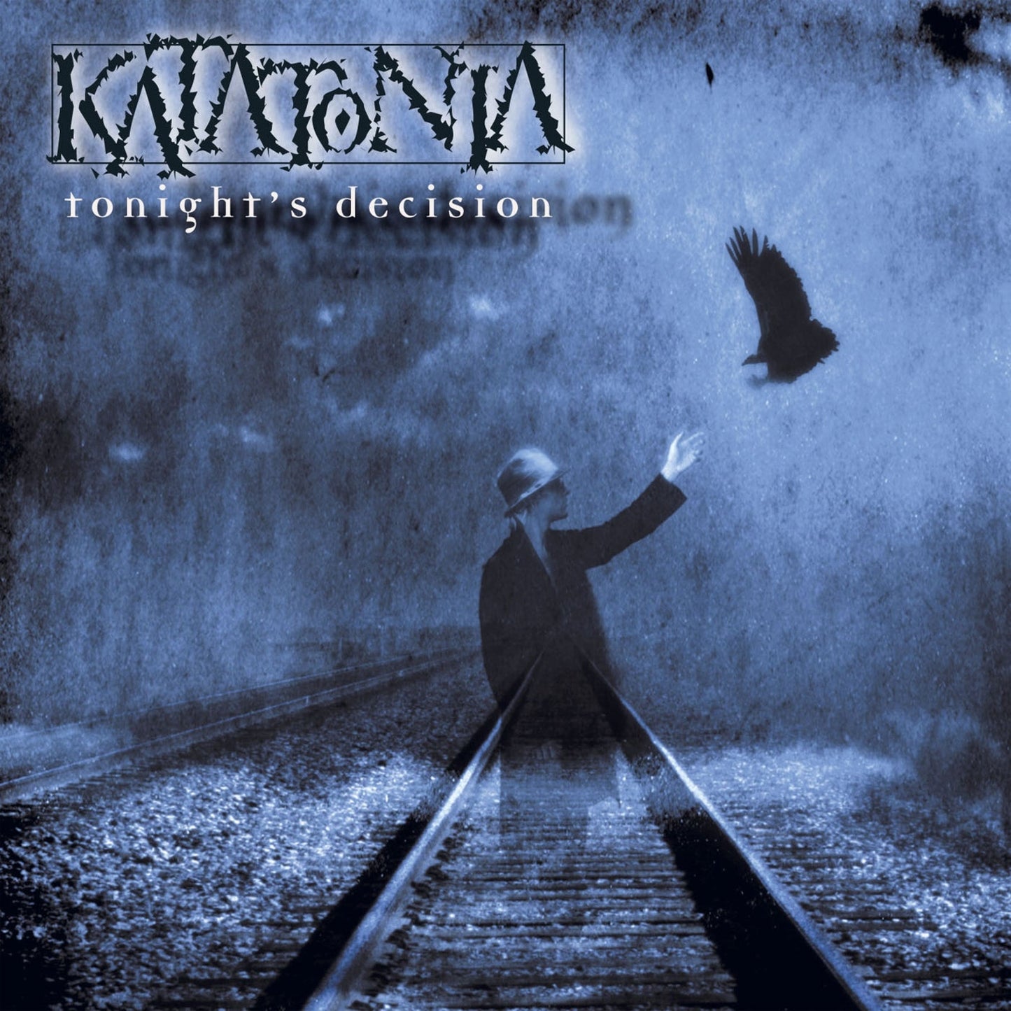 Katatonia album cover: person reaching for a flying bird on train tracks.