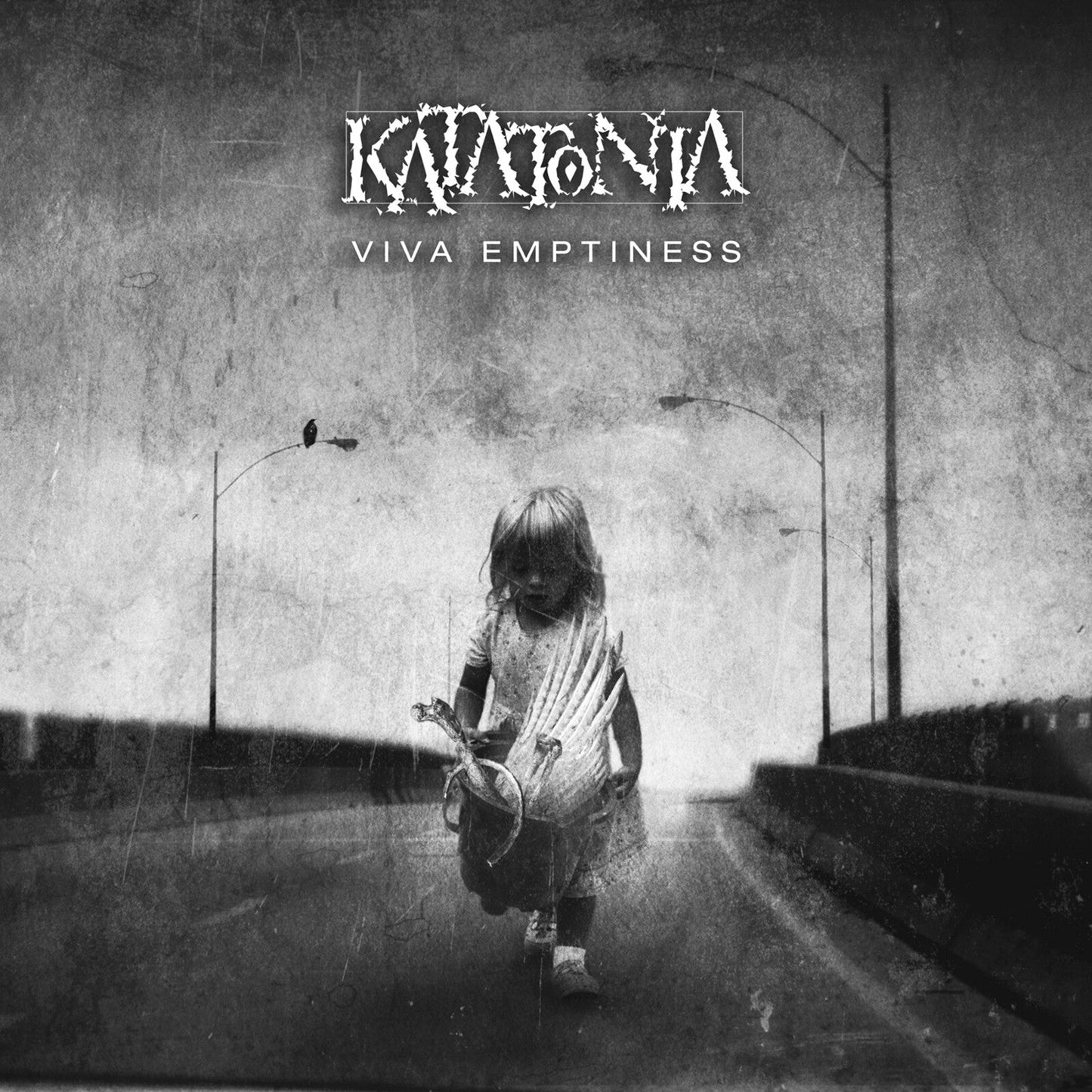 Katatonia album cover: child walking down a desolate, empty road.