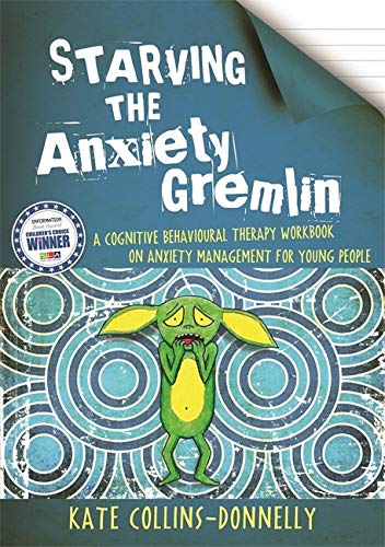 Book cover with a green cartoon gremlin on a blue circular patterned background.