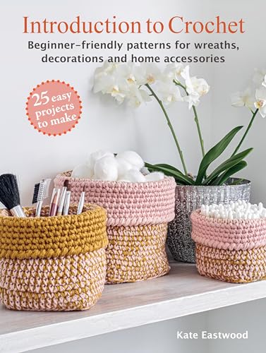 Crochet book cover with woven baskets, orchids, and crafting supplies.