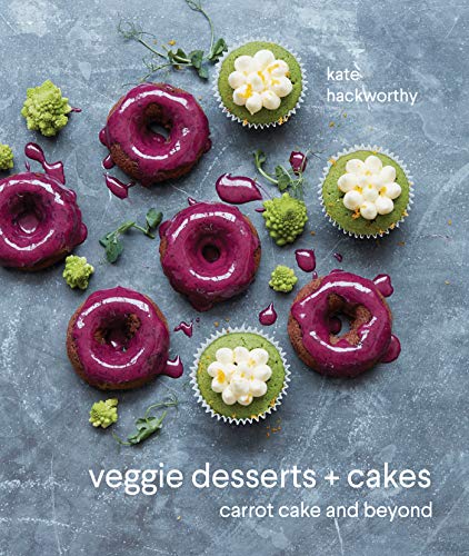Purple glazed donuts and green frosted cupcakes with scattered vegetables.