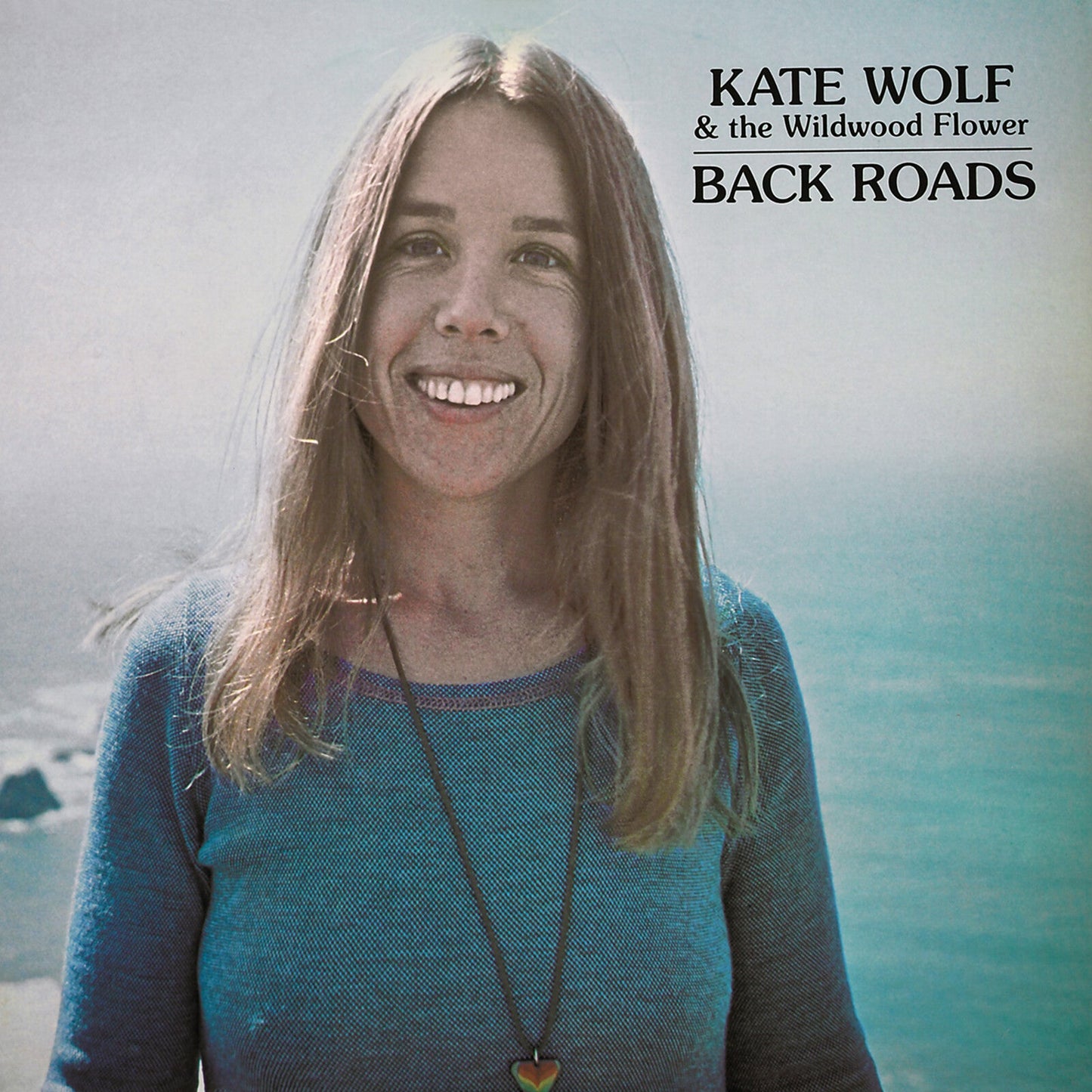 Kate Wolf album cover, "Back Roads," featuring a portrait of the artist.