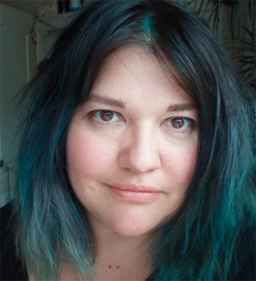 A close-up portrait of a woman with dark hair featuring teal highlights.