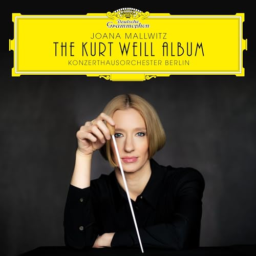 Joana Mallwitz holding a baton against a dark background, with the yellow Deutsche Grammophon logo.