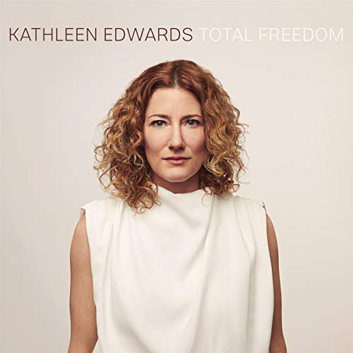 Album cover featuring a woman with curly red hair wearing a white sleeveless top.