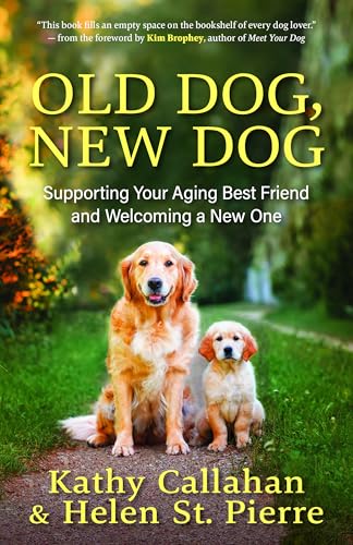 Book cover with an older golden retriever and a puppy in grass.