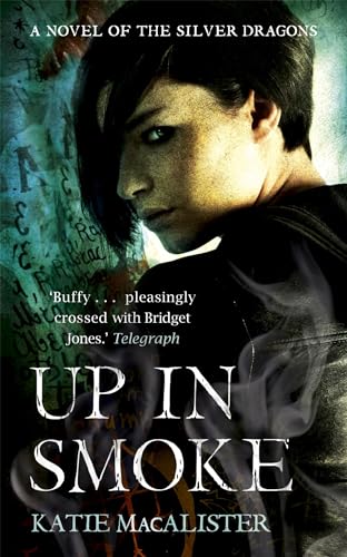 Book cover: woman’s face, smoky background, title “Up In Smoke.”