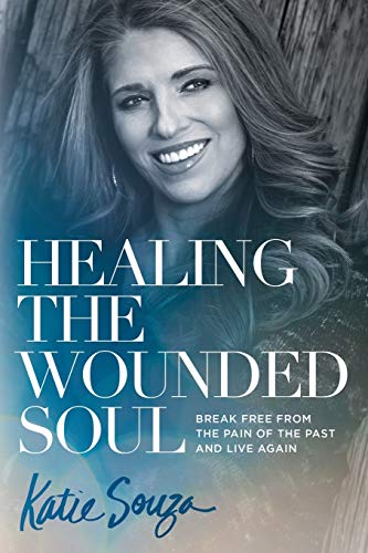 Book cover featuring a smiling woman, title "Healing the Wounded Soul.