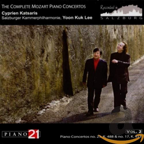 CD cover featuring two men walking along a stone wall in Salzburg.