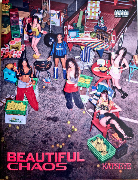 CD cover: group of people in a chaotic, colorful outdoor market scene.