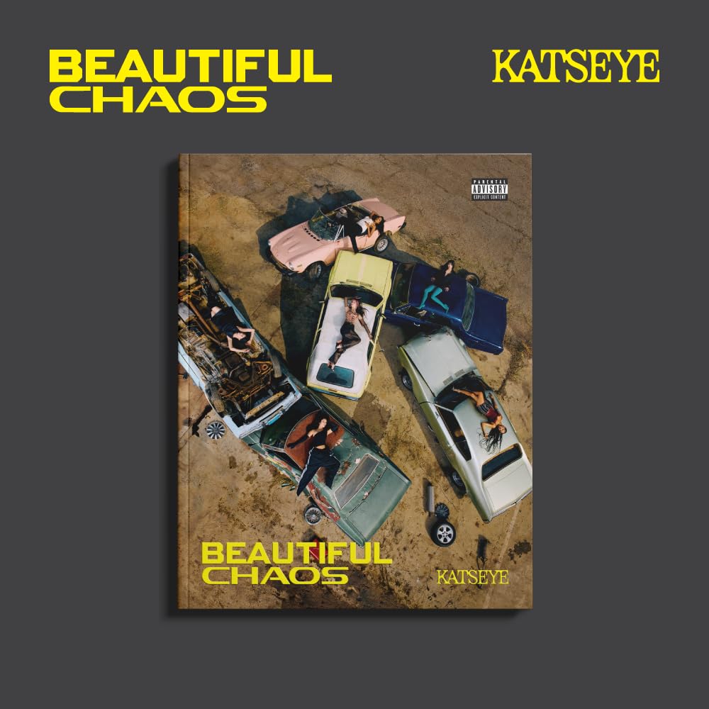 CD cover with a chaotic scene of wrecked cars and figures.