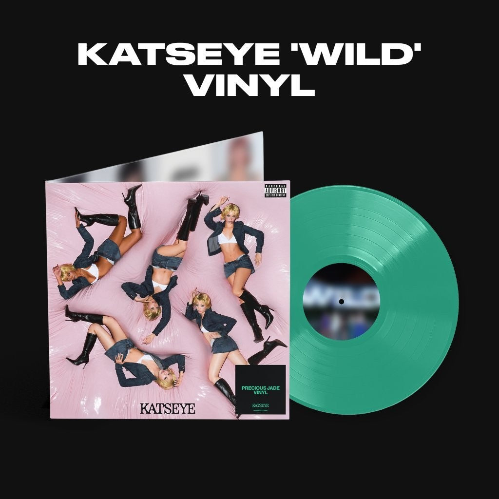 Green vinyl record with album cover featuring a woman in pink.