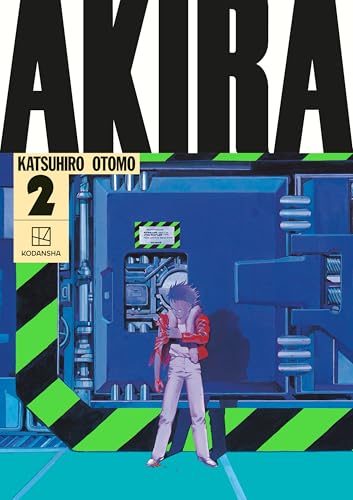 AKIRA volume 2 hardcover cover with a young man in a blue corridor.