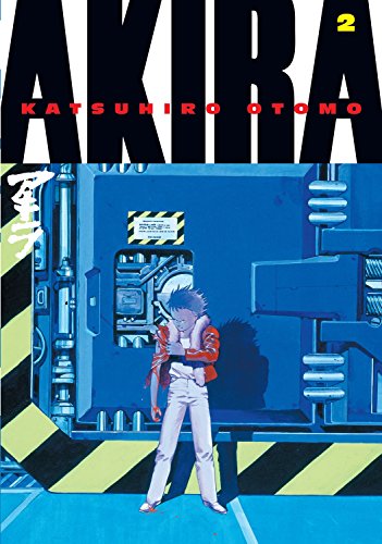 Akira Volume 2 manga cover featuring a character standing before a large blue machine.