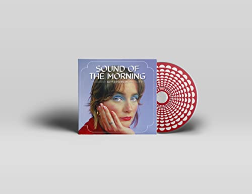 CD case with portrait of a woman and a red CD visible.