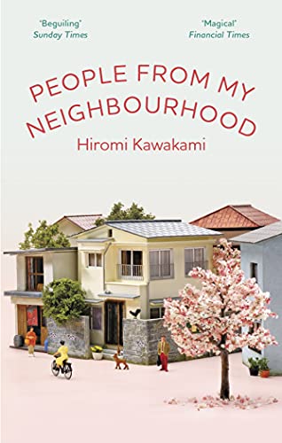 Book cover showing a miniature Japanese neighborhood with houses, a cherry blossom tree, and figures.