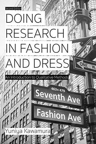 Book cover showing street signs for Seventh Ave and Fashion Ave in New York.