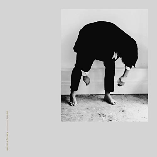 Black and white album cover featuring a person bending over, barefoot.